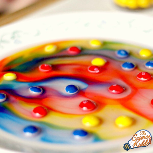 Making a Skittles rainbow is a quick and easy kitchen science experiment that will thrill the kids and engage their creativity. STEM for St. Patrick's Day.