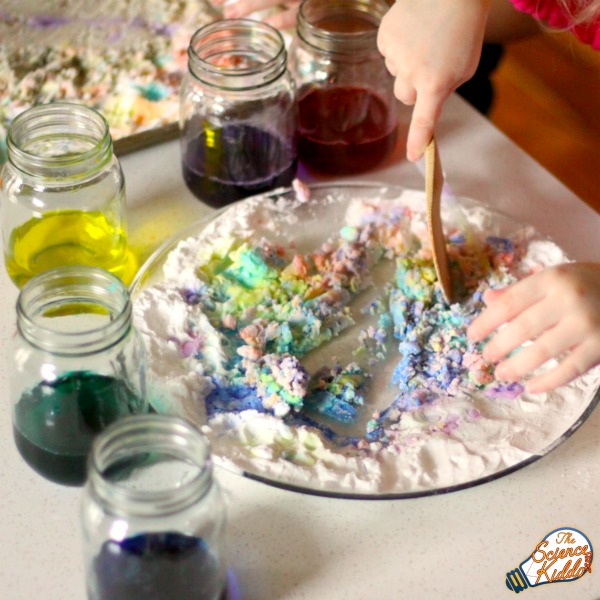 This baking soda and vinegar experiment engages kids' creativity and imagination by using leftover Easter egg dye to create bright and colorful process art.